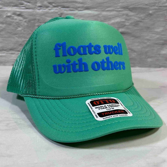 Floats Well With Others Trucker Hat