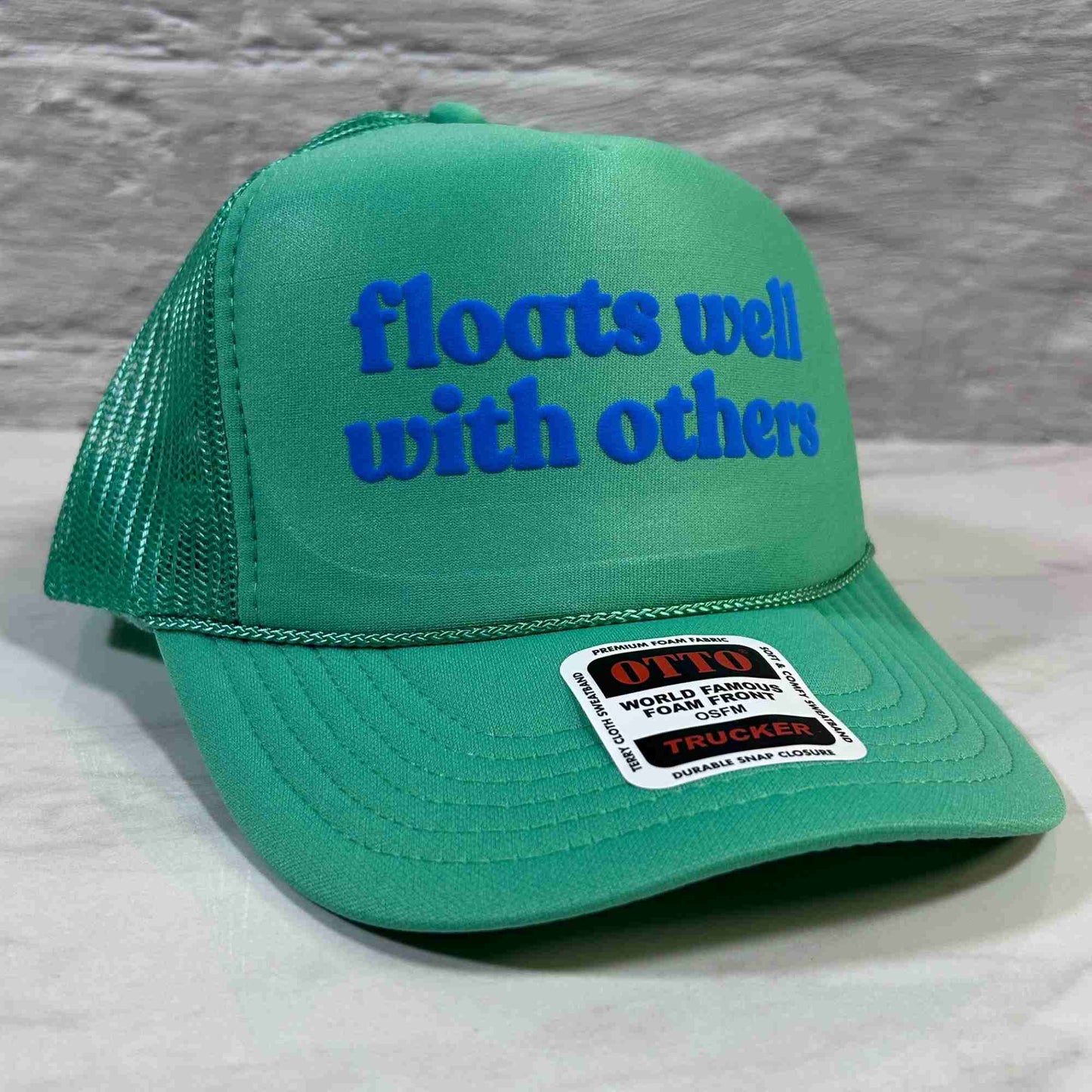 Floats Well With Others Trucker Hat